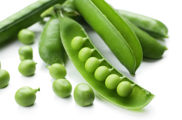 Fresh green peas isolated on white