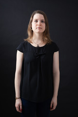 Beautiful woman doing different expressions in different sets of clothes: posing