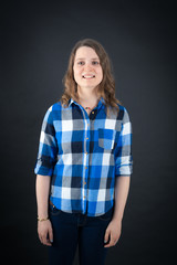 Beautiful woman doing different expressions in different sets of clothes: smile