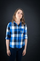 Beautiful woman doing different expressions in different sets of clothes: tired