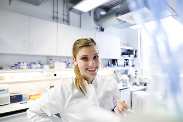 Young female scientist working at biological laboratory