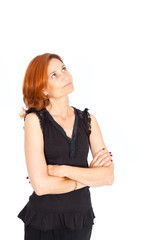 Obraz premium Beautiful businesswoman doing different expressions in different sets of clothes: arms crossed