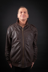 Obraz premium Handsome man doing different expressions in different sets of clothes: at attention