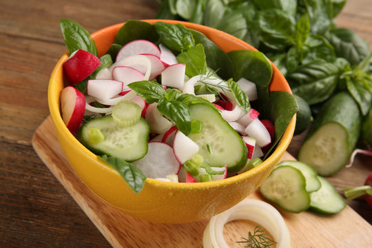 Fresh vegetable salad on table close up