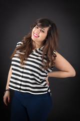 Beautiful woman doing different expressions in different sets of clothes: smile