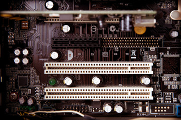 Old dusty pc motherboard detail, ram location