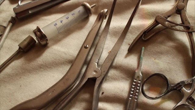 MEDICAL SURGICAL EQUIPMENT: Medium Close up Circular Dolly overhead vintage surgeons gear