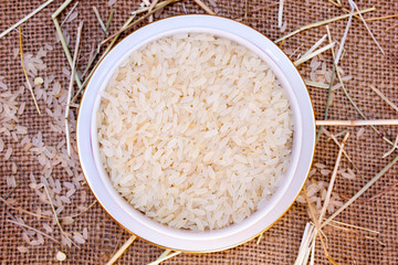 Uncooked rice in  bowl