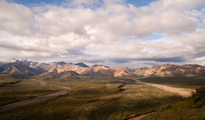 Puffy clouds blue sky Alaska Range Denali National Park