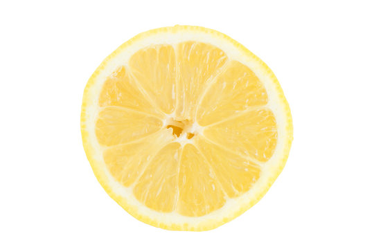 Close-up of a sliced lemon viewed from the front, isolated on white background.