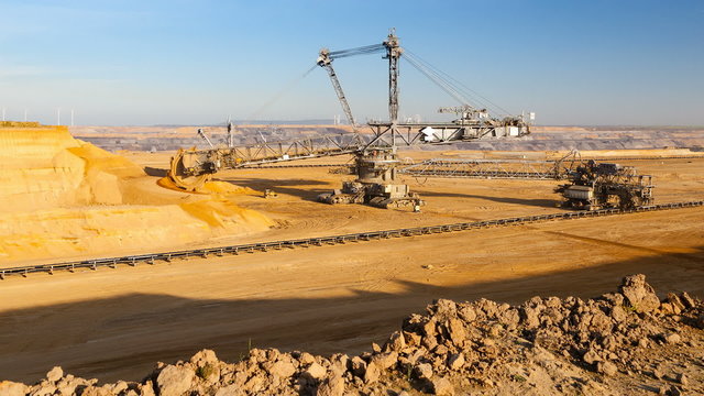 Timelapse sequence of a giant Bucket Wheel Excavator at work in an endless lignite pit mine