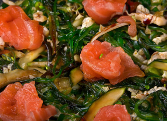 Salad with red fish and vegetable
