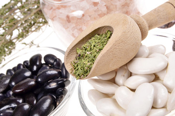 dried winter savory,Himalayan salt ,lima beans background,selective focus