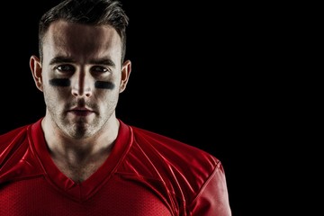 Obraz premium American football player looking at camera