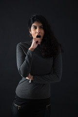 Fototapeta premium Beautiful woman doing different expressions in different sets of clothes: yawn