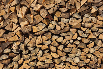 Chopped Firewood in Village. Background