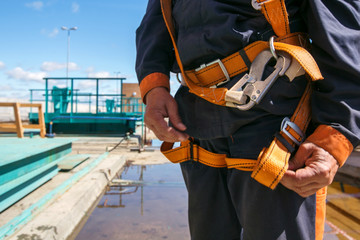 Fototapeta na wymiar Builder Worker in safety protective equipment on bridge construction