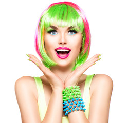 Surprised beauty fashion model girl with colorful dyed hair