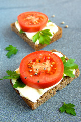 Sandwiches with tomatoes, cream cheese