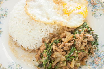 fried basil chicken fried egg thai food