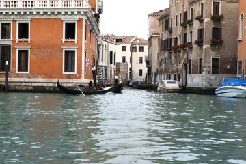 Fototapeta na wymiar Canal with boats, Venice, Italy