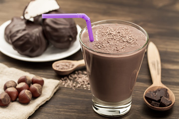 delicious chocolate shake with heart on wooden background. Cocktail, smoothies