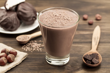 delicious chocolate shake with heart on wooden background. Cocktail, smoothies