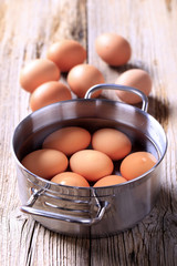 Brown eggs in a pan