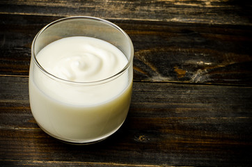 Homemade yogurt on wooden background,healthy food