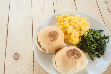 set morning.scrambled Eggs.boiled vegetables.Burger Buns.Serving