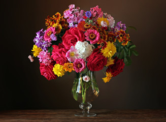 Still life with a beautiful bouquet of cultivated flowers