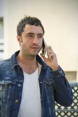 Attractive man talking with mobile phone