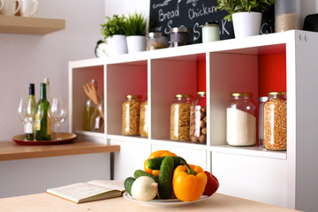 Pile of organic vegetables on a rustic wooden table