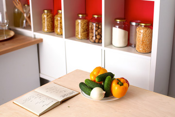 Pile of organic vegetables on a rustic wooden table