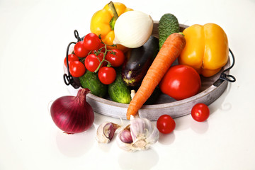 Pile of organic vegetables on a rustic wooden table