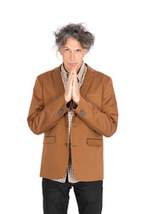 Handsome man doing different expressions in different sets of clothes: praying