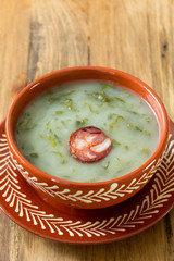 portuguese soup caldo verde in ceramic dish
