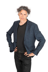 Fototapeta premium Handsome man doing different expressions in different sets of clothes:arms crossed