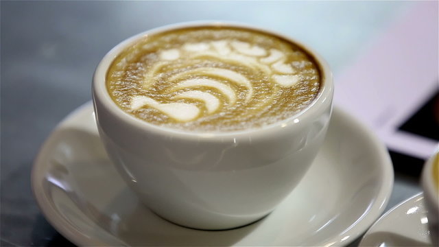 A delicious cup of latte. Latte art.