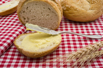 Sliced of round bread with butter
