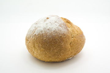 One loaf of round fresh sourdough bread