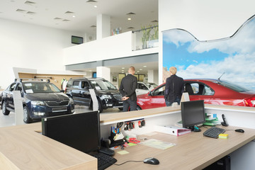 Kaluga, Russia, August, 19, 2015: Working place of managers in a dealer's car showroom in Kaluga, Russia