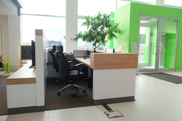Working place of managers in a dealer's car showroom