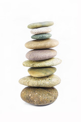Balanced Zen stones isolated on white background