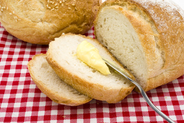 Sliced of round bread with butter