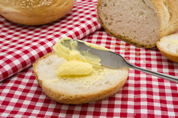 Sliced of round bread with butter