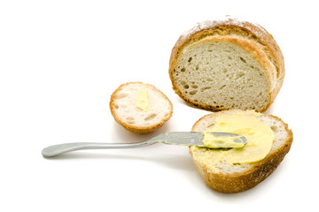 Sliced of round bread with butter