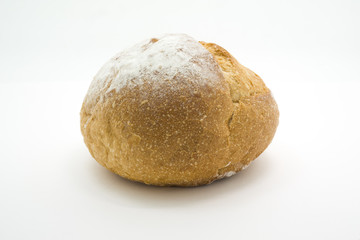 Fototapeta na wymiar One loaf of round fresh sourdough bread