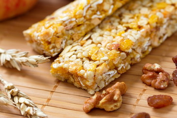Cereal bars of granola with apples, nuts and raisins