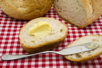Sliced of round bread with butter